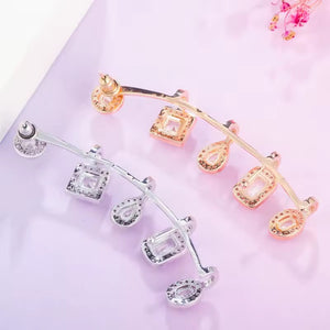 Cubic multi stud earring