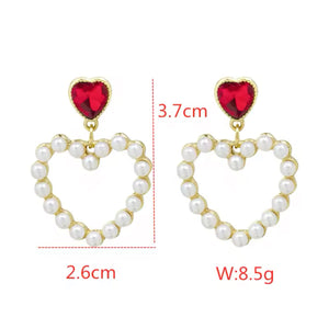 Enchanted pearly heart earrings